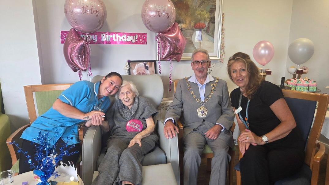 people sat down for a birthday celebration