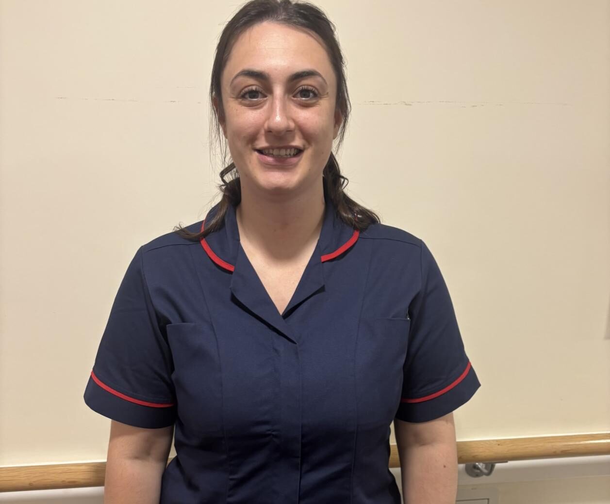 woman posing for staff photo